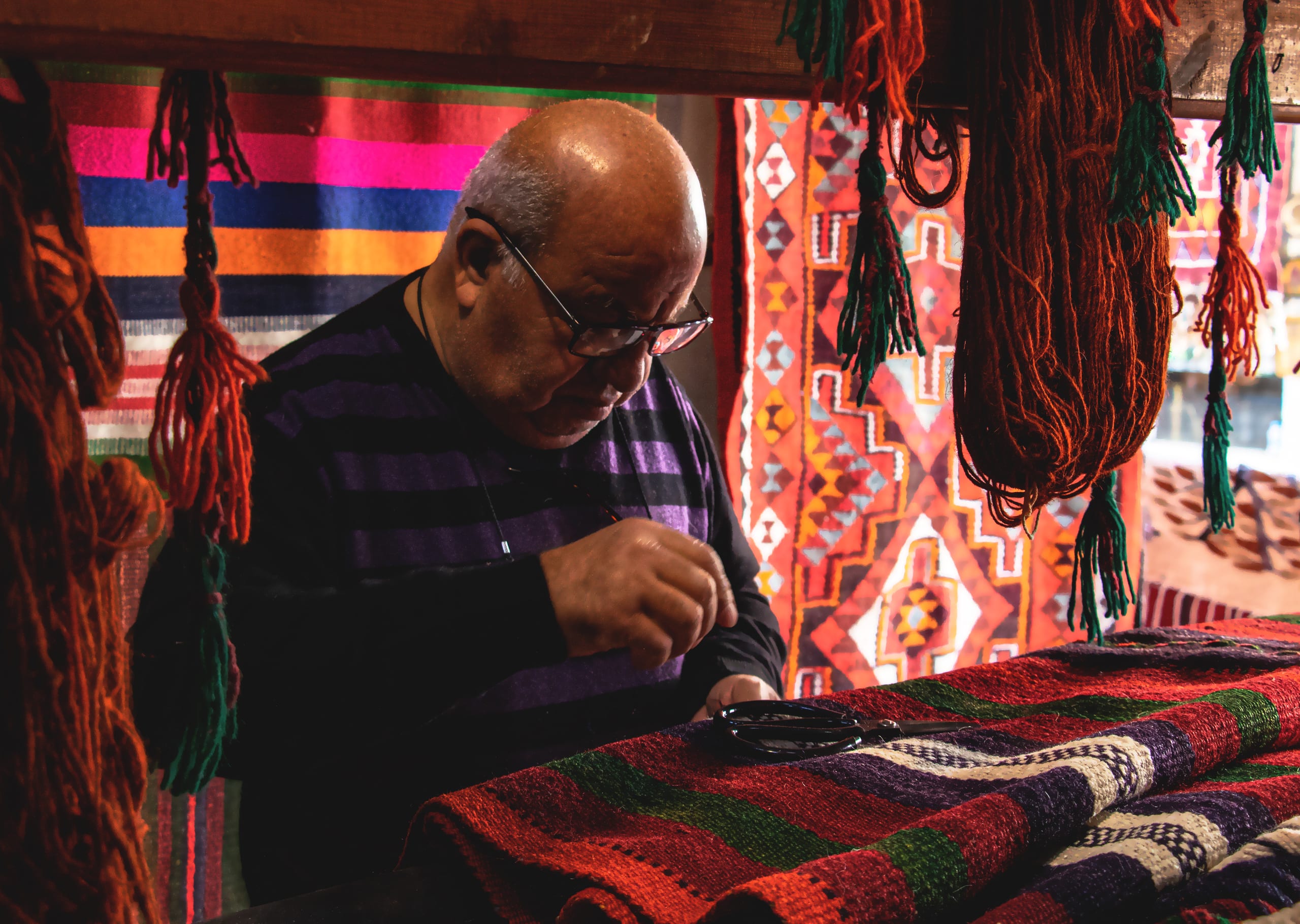 Madaba Market Carbets Store MAN, a fine-art photograph by Ali Abu Ras