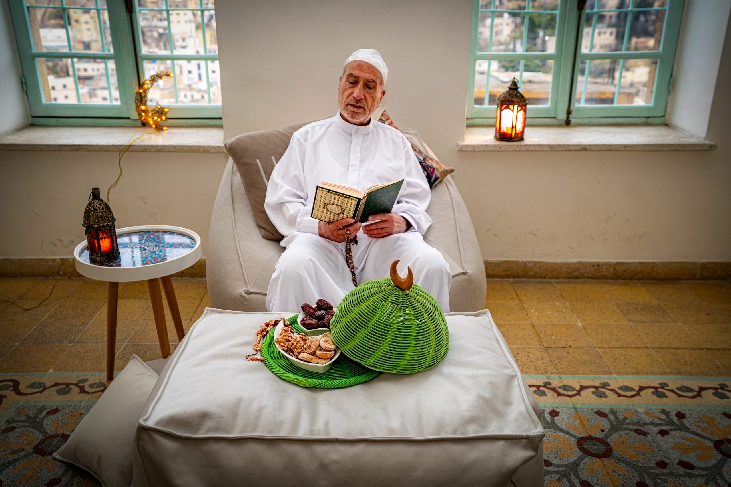 MAN OLD Read Quran Ramadan City Background, a fine-art photograph by Ali Abu Ras