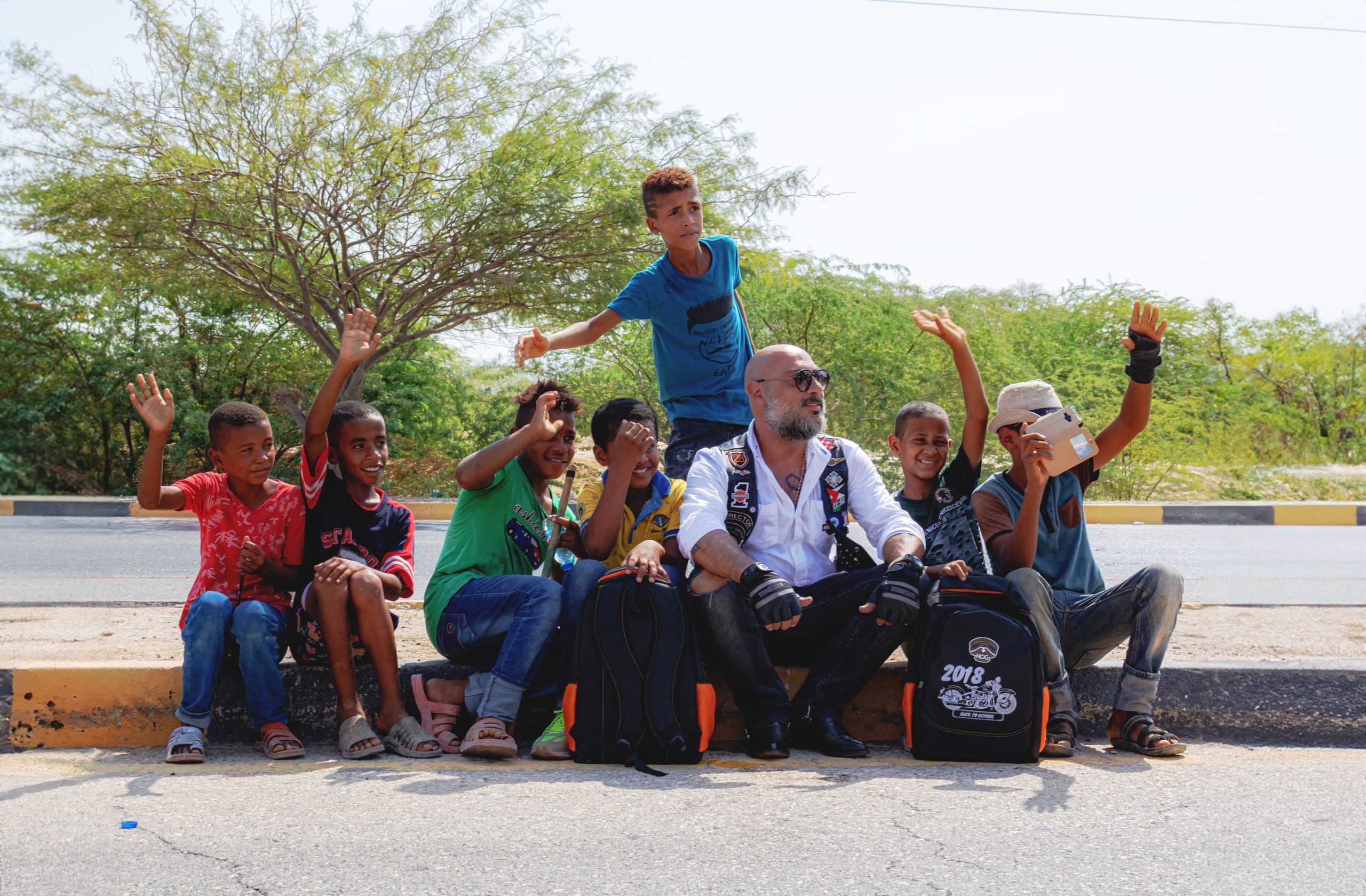 HOG Life Style People Onelove Street, a fine-art photograph by Ali Abu Ras