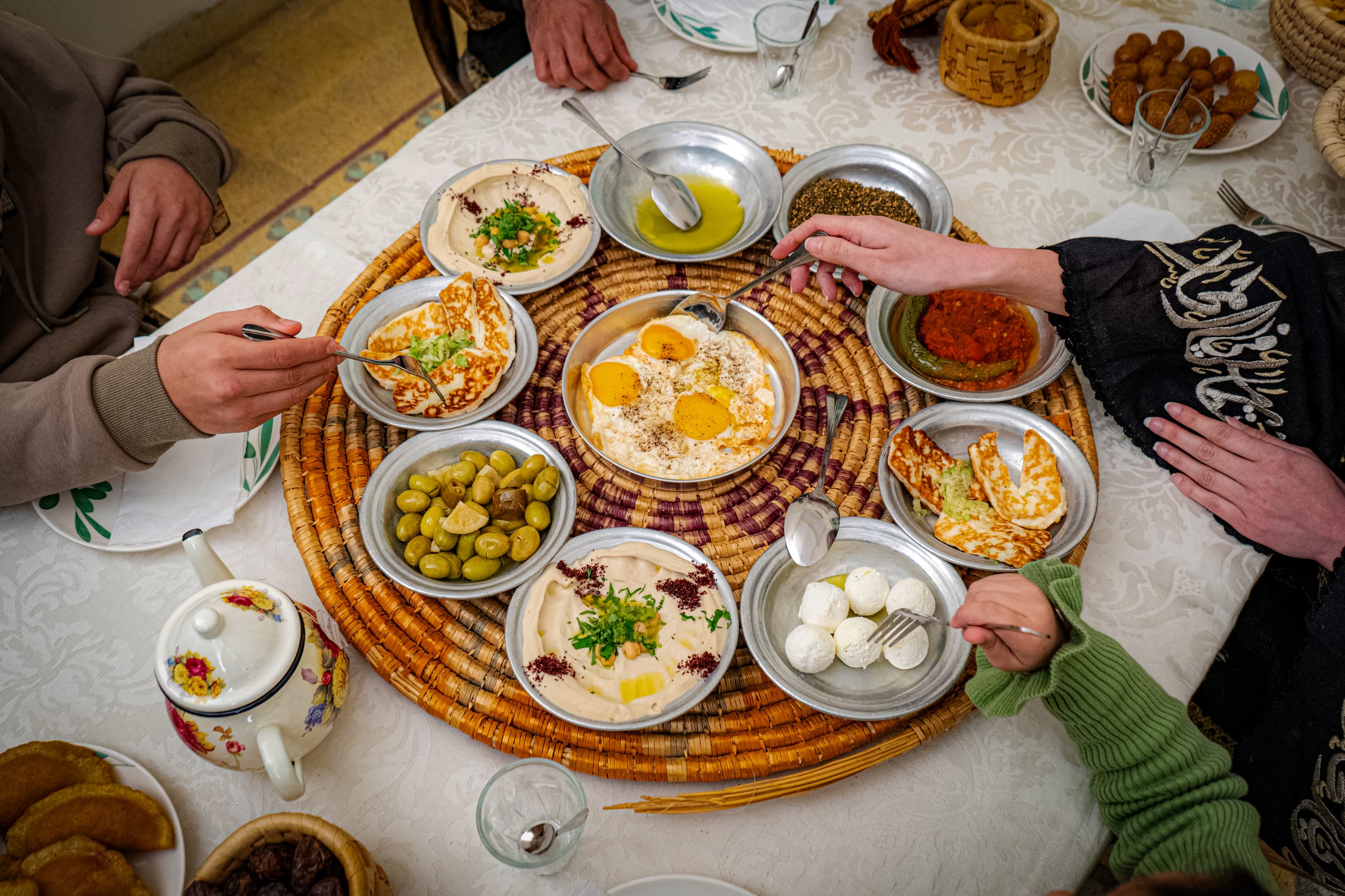 Family Ramadan Eftar Food Eating, a fine-art photograph by Ali Abu Ras