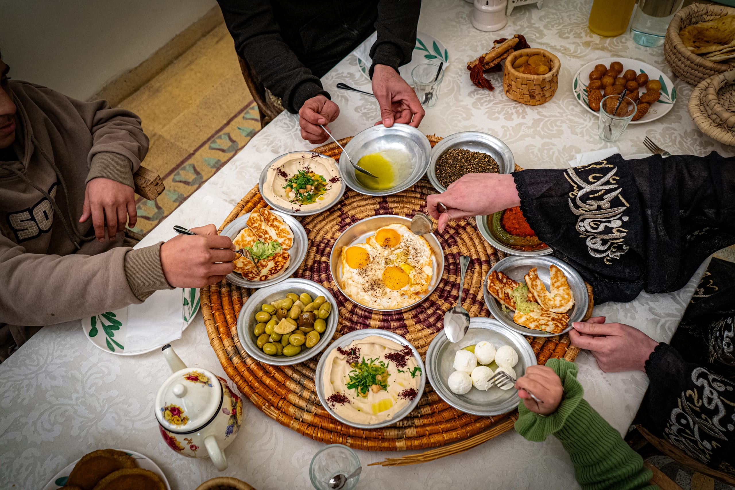 Family Ramadan Eftar Food Eating, a fine-art photograph by Ali Abu Ras
