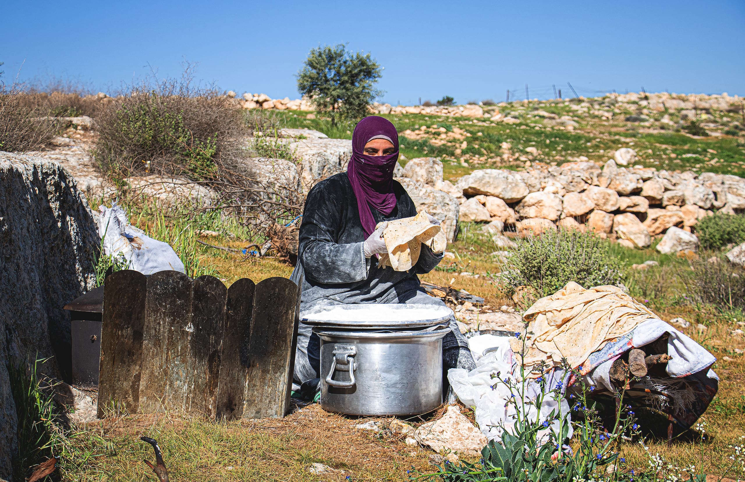 Woman Work Create Bread Outdoor Graesa, a fine-art photograph by Ali Abu Ras