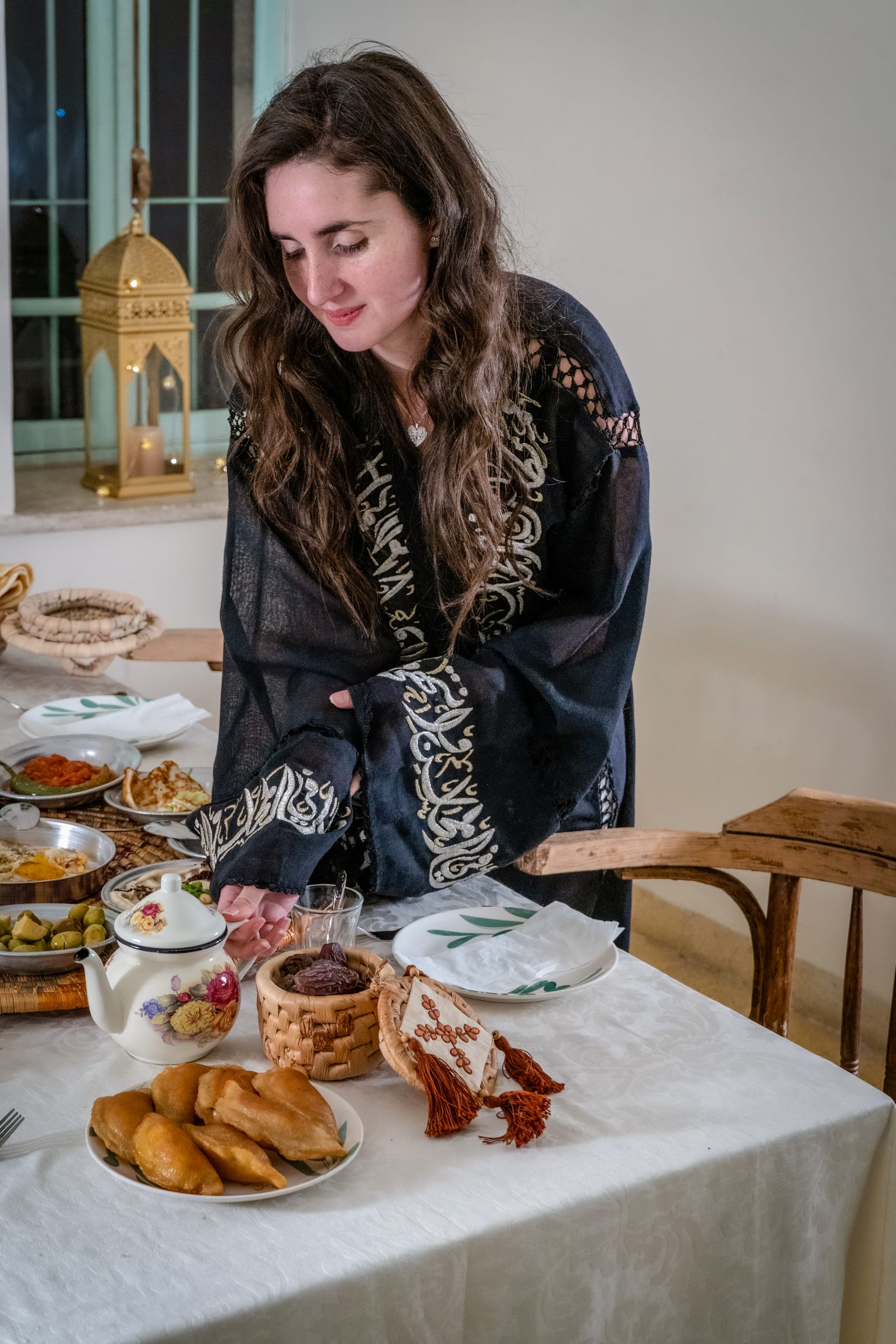 Ramadan Woman Noor Eftar Sohour, a fine-art photograph by Ali Abu Ras
