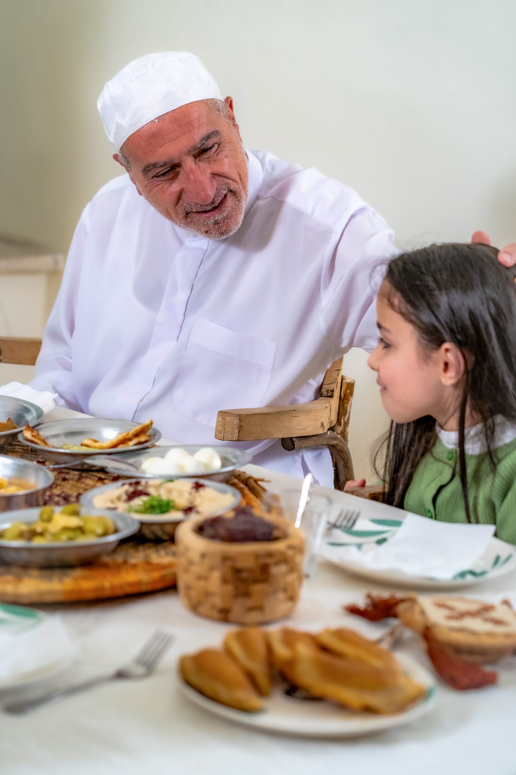 1 Family Ramadan Eftar Food Eating, a fine-art photograph by Ali Abu Ras