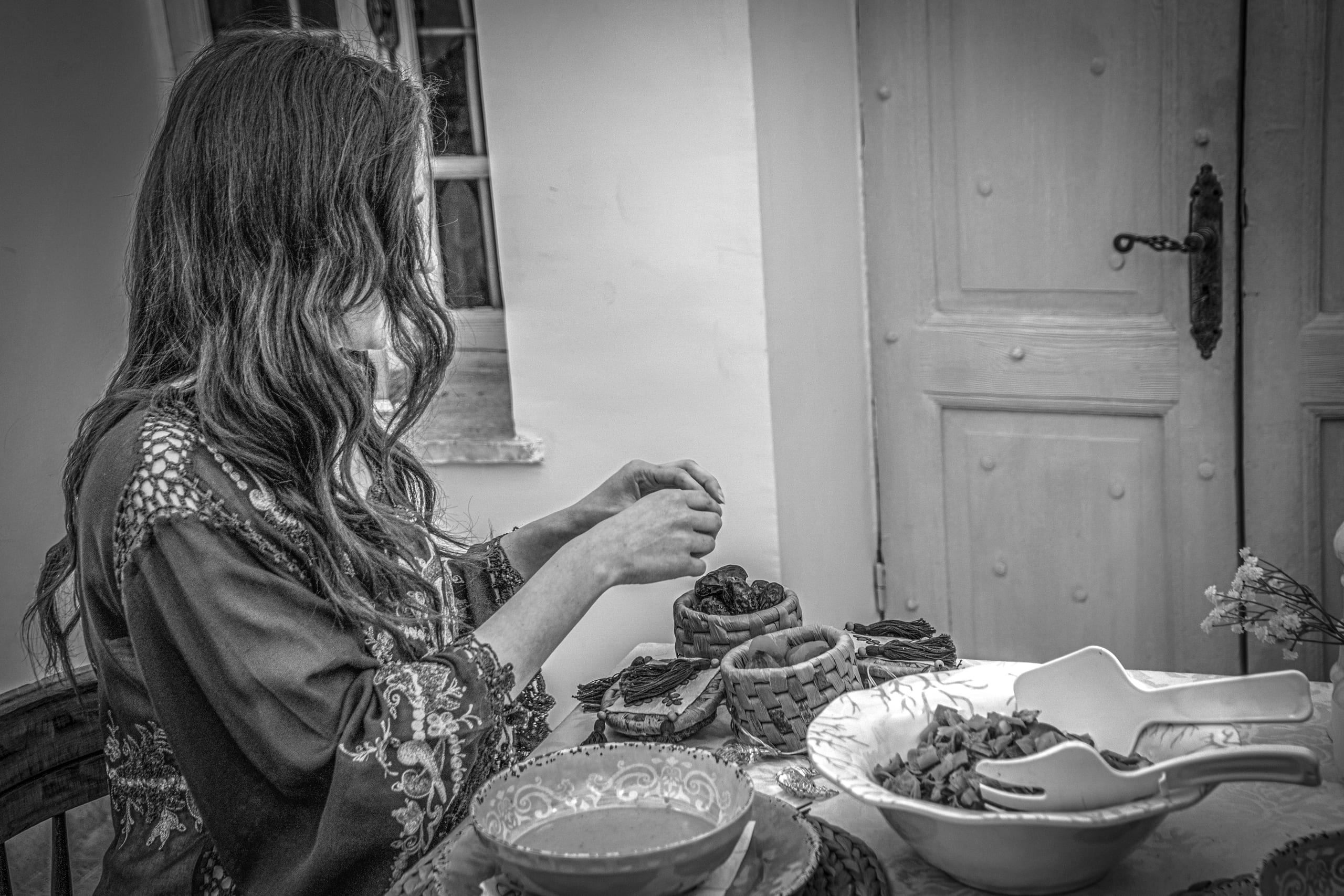 Ramadan Woman Noor Eftar Sohour, a fine-art photograph by Ali Abu Ras