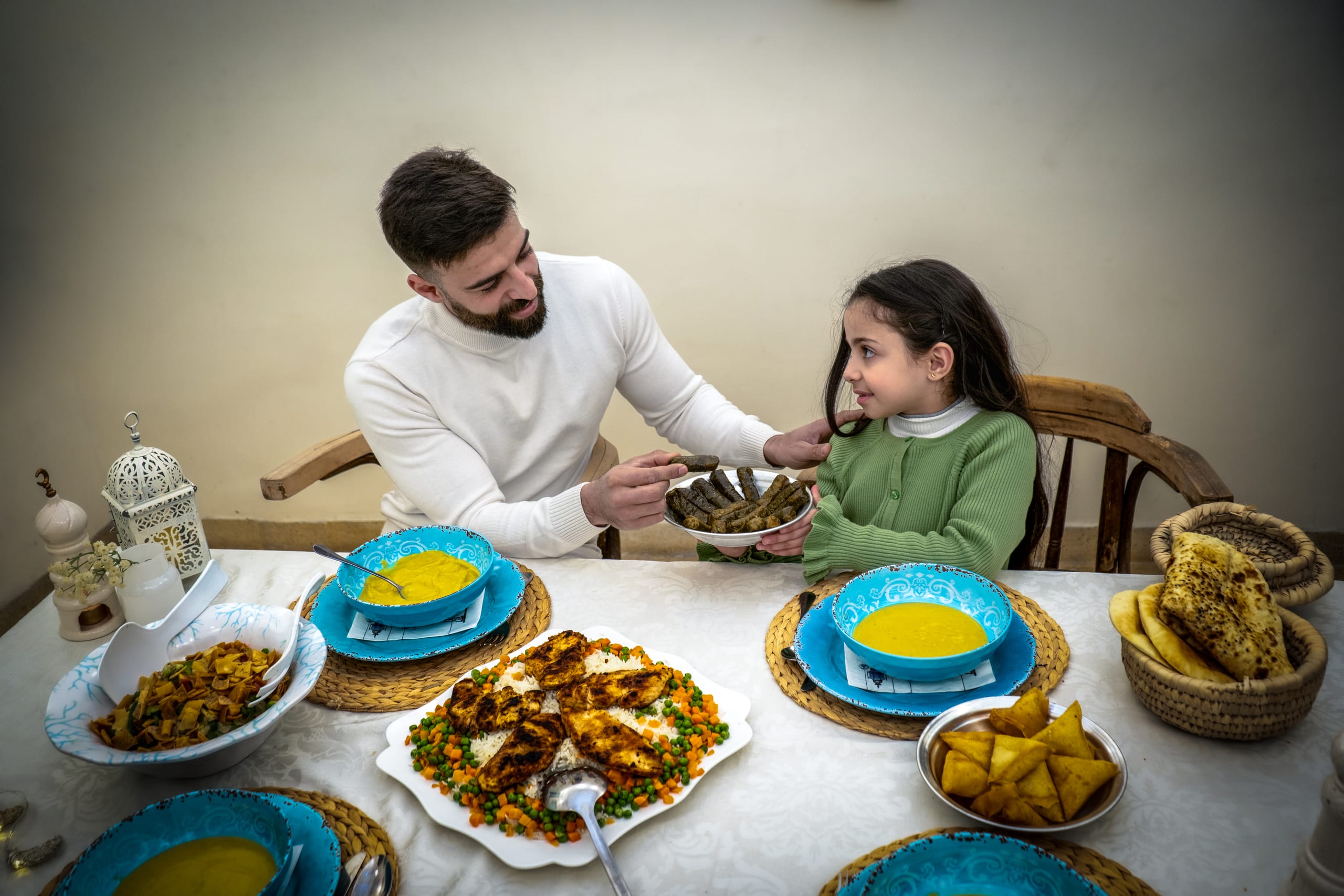Family Ramadan Eftar Food Eating, a fine-art photograph by Ali Abu Ras
