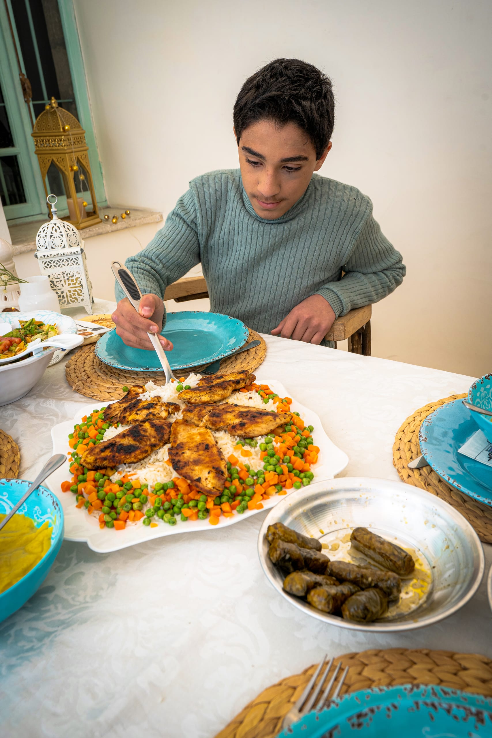 Family Ramadan Eftar Food Eating, a fine-art photograph by Ali Abu Ras
