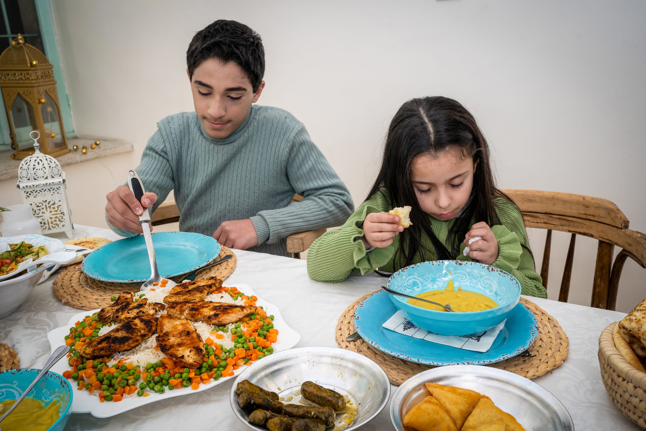 Family Ramadan Eftar Food Eating, a fine-art photograph by Ali Abu Ras