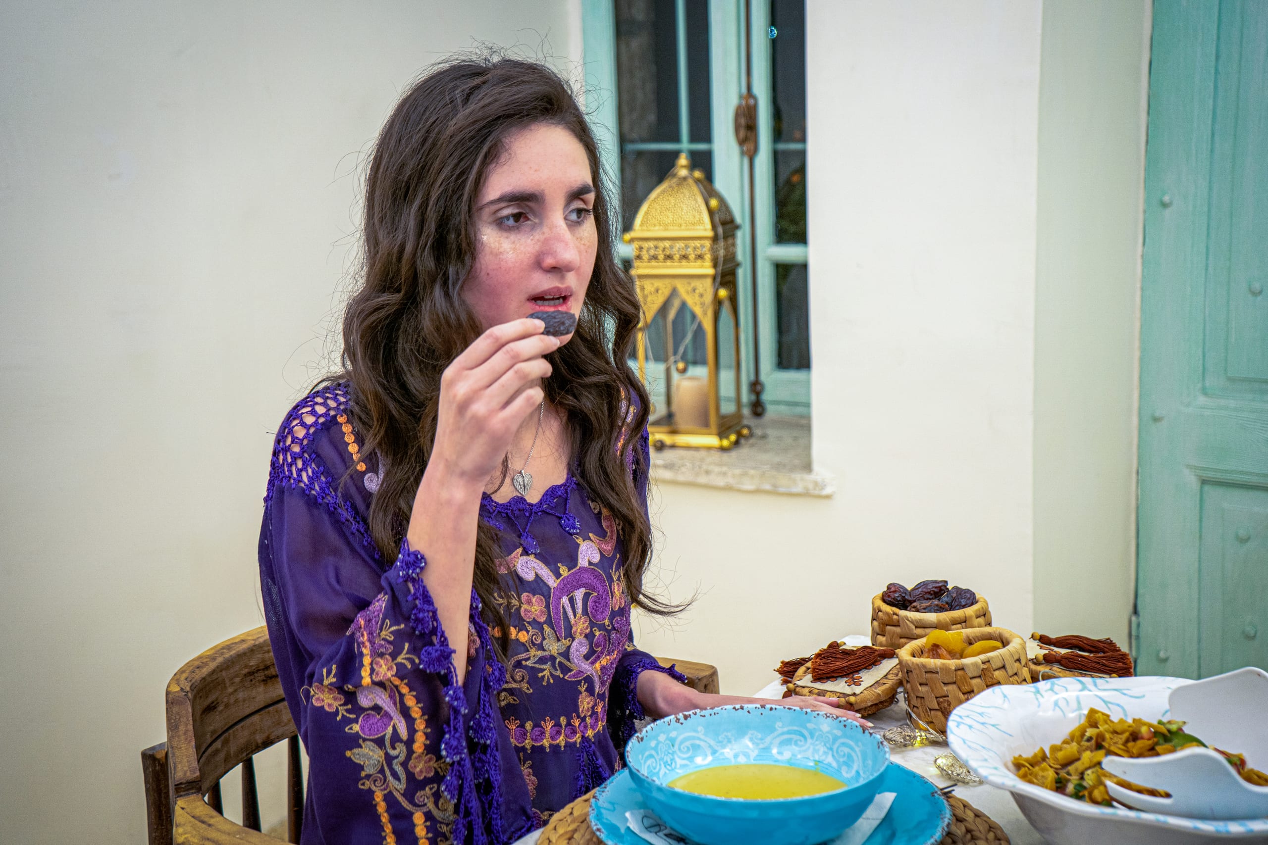 Ramadan Woman Noor Eftar Sohour, a fine-art photograph by Ali Abu Ras