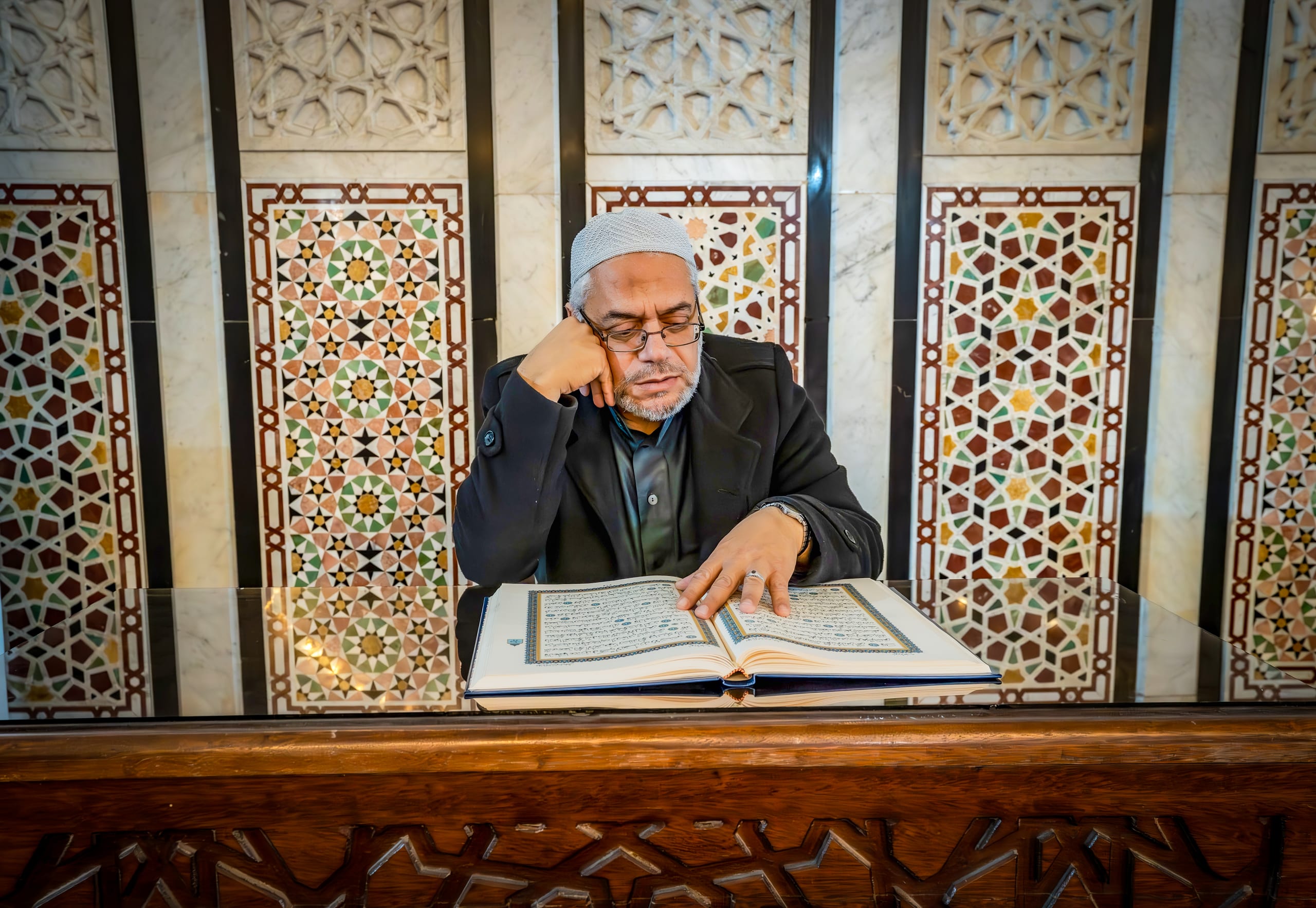 MAN Read Quran Masjid Ramadain Sunlight, a fine-art photograph by Ali Abu Ras