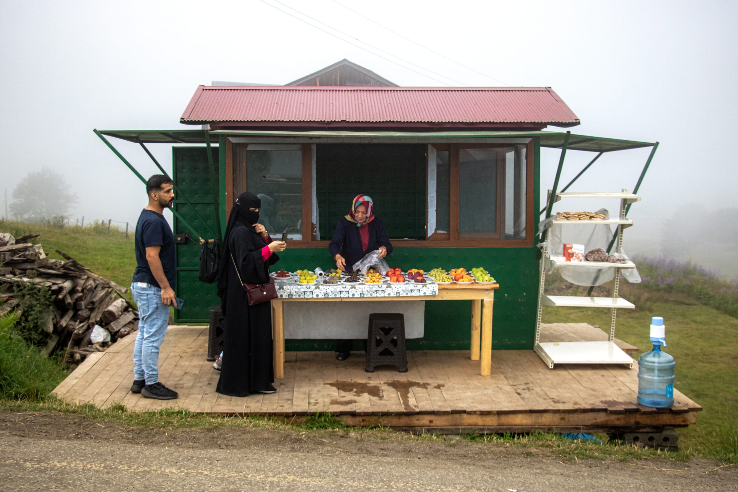 Food Seler Woman Working Seal Tarabzon, a fine-art photograph by Ali Abu Ras