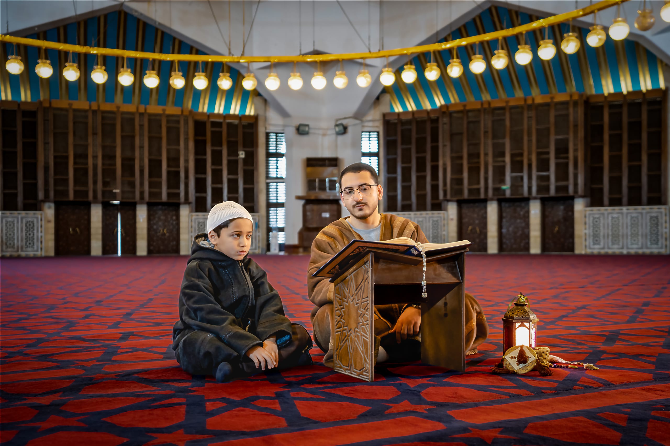 BOY Father Masjed Quran, a fine-art photograph by Ali Abu Ras