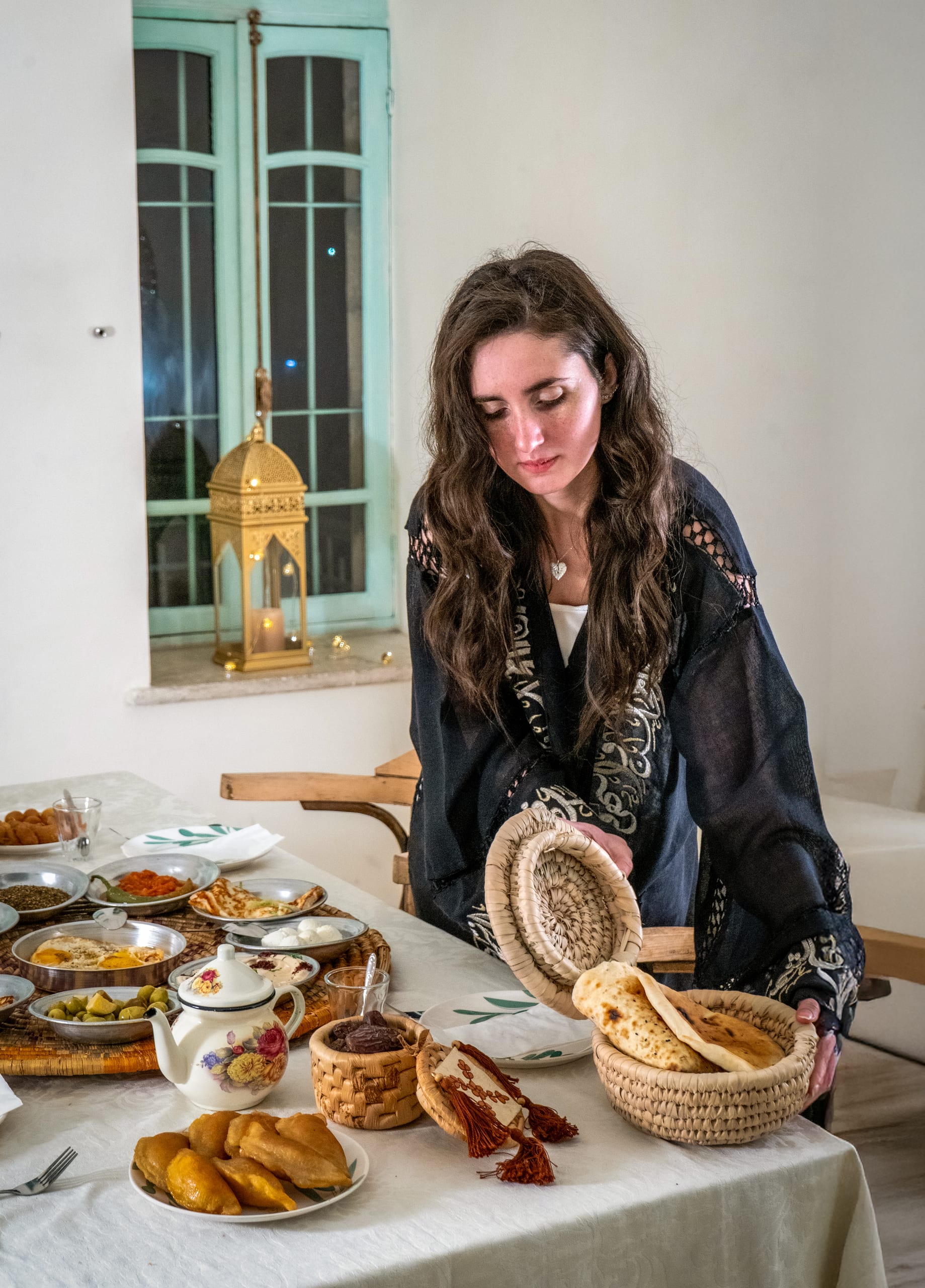 Ramadan Woman Noor Eftar Sohour, a fine-art photograph by Ali Abu Ras