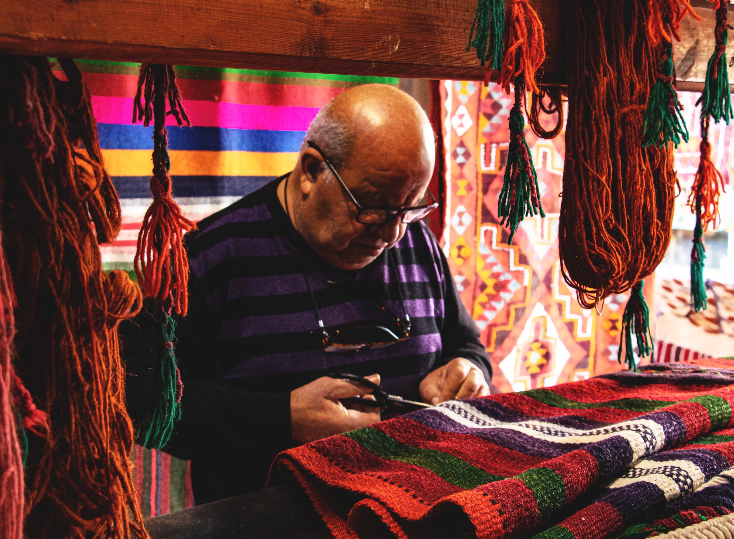 Madaba Market Carbets Store MAN, a fine-art photograph by Ali Abu Ras