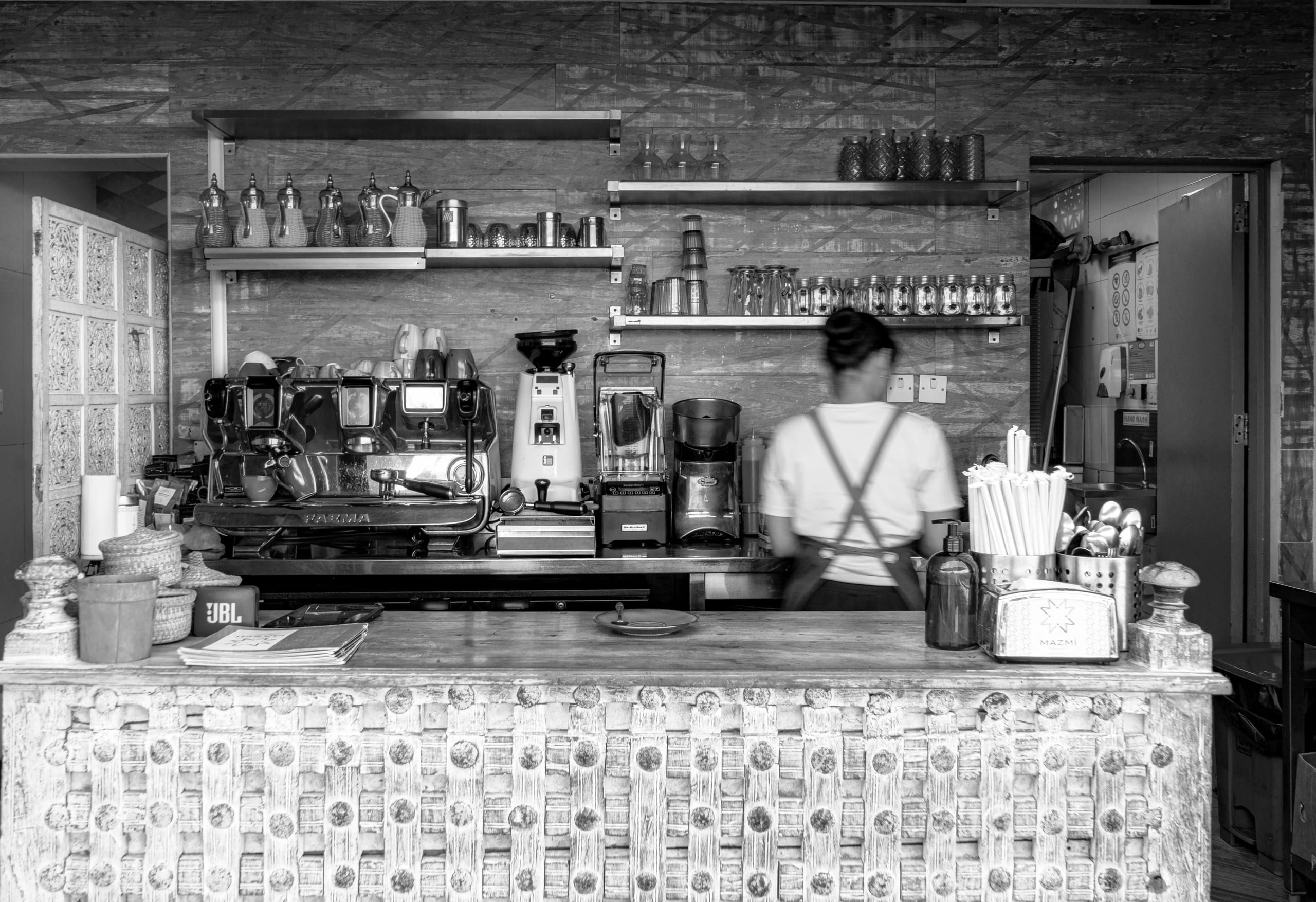 Woman Worker Water Coffee Plaee OLD Dubai, a fine-art photograph by Ali Abu Ras