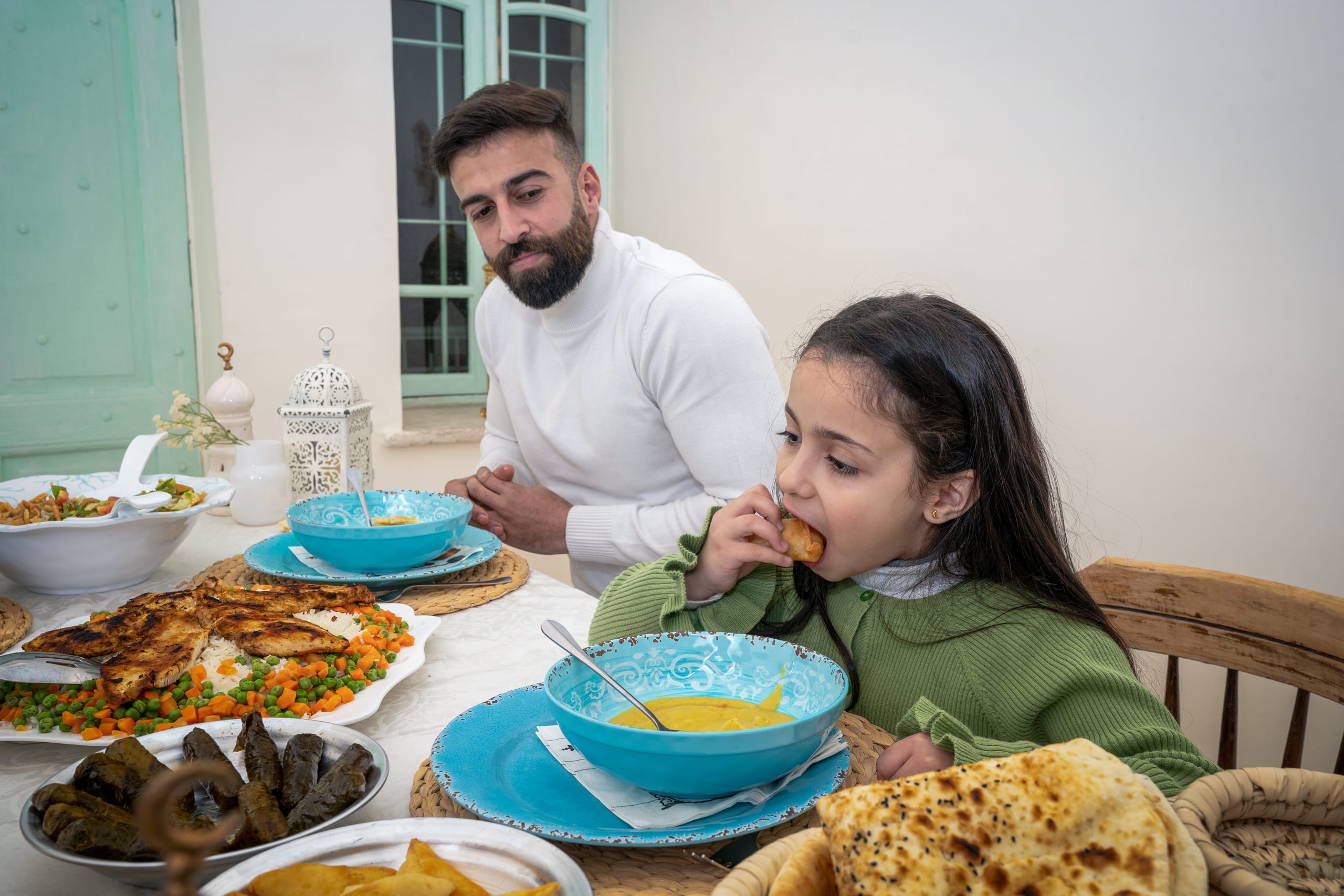 Family Ramadan Eftar Food Eating, a fine-art photograph by Ali Abu Ras