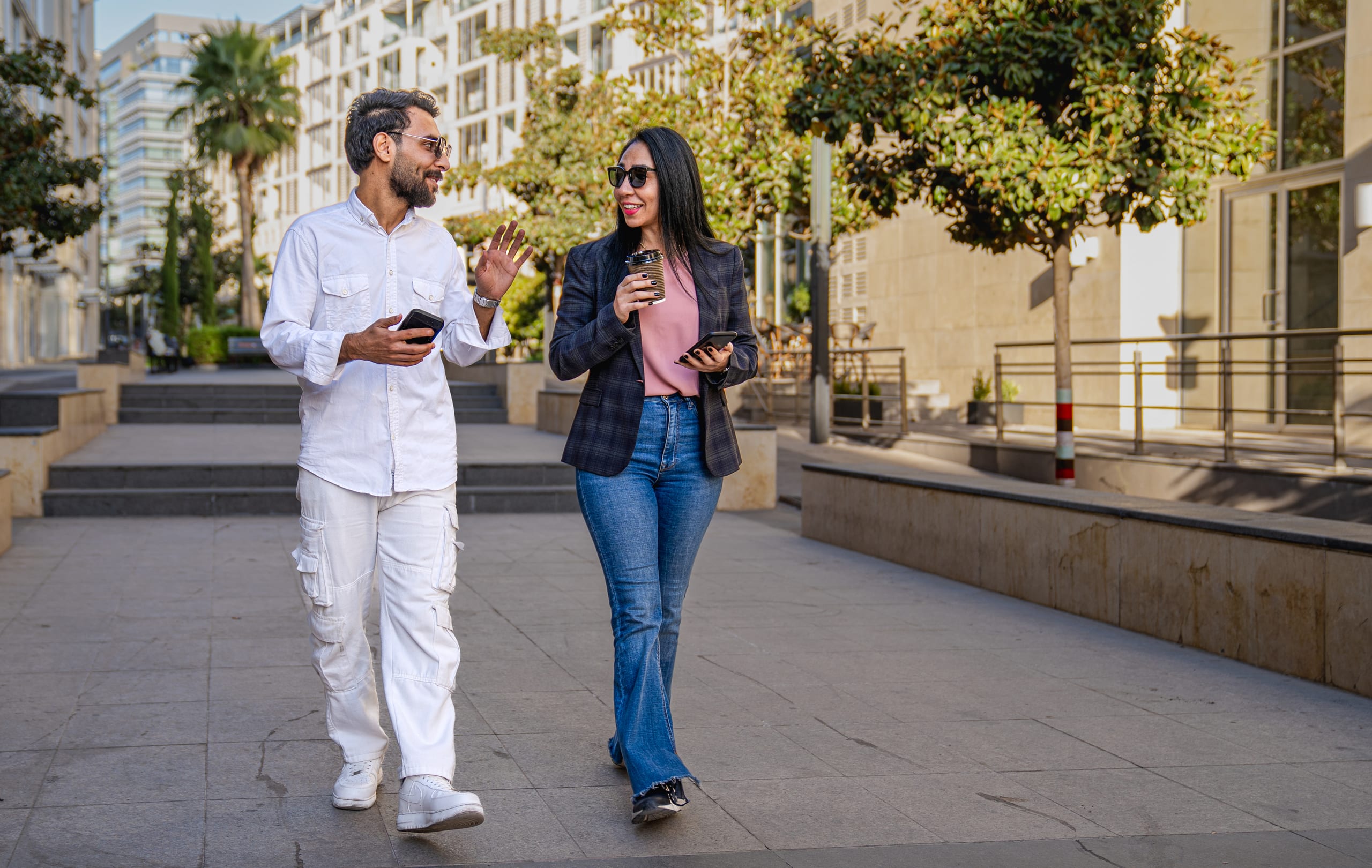 MAN Woman Walking, a fine-art photograph by Ali Abu Ras