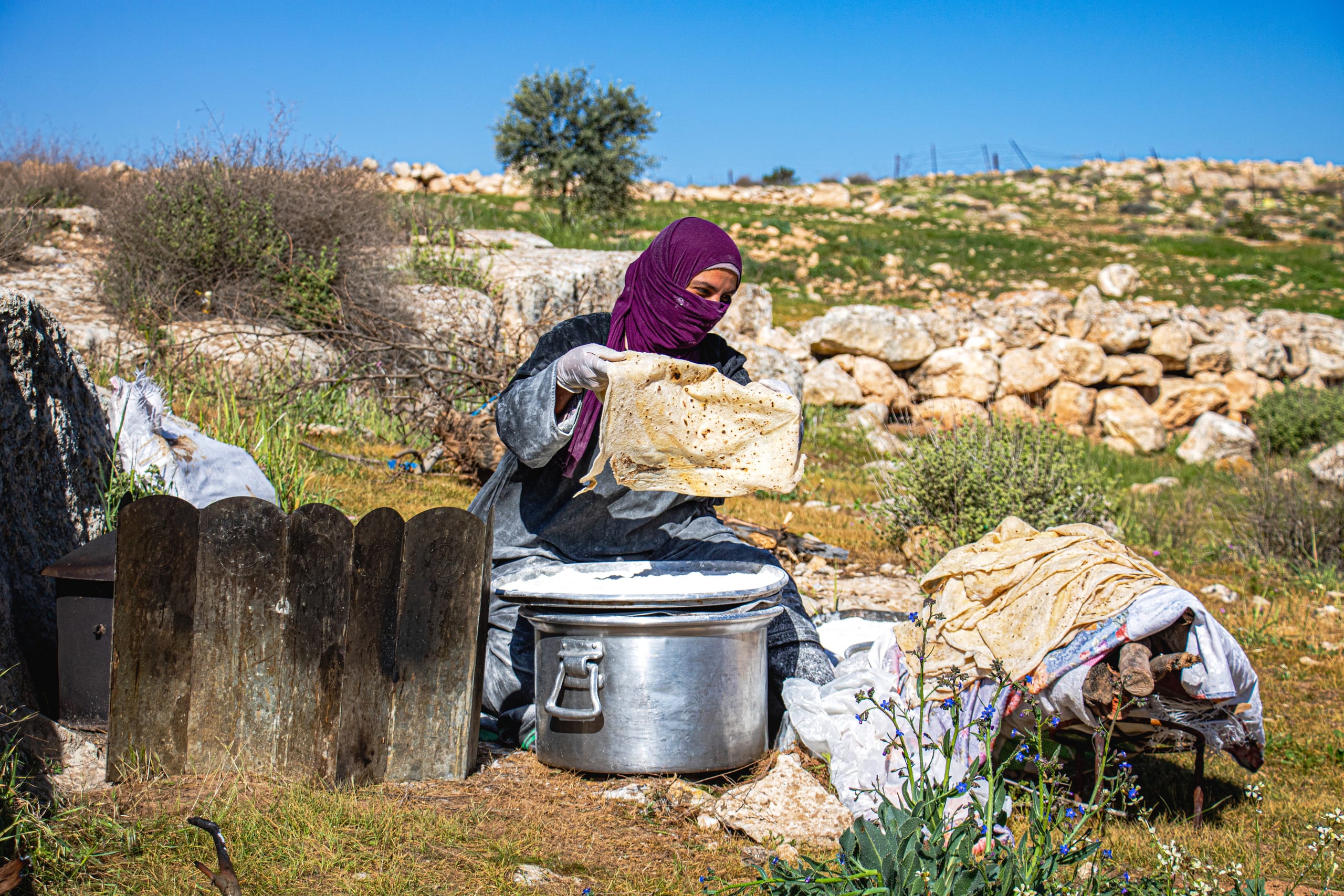 Woman Work Create Bread Outdoor Graesa MB, a fine-art photograph by Ali Abu Ras