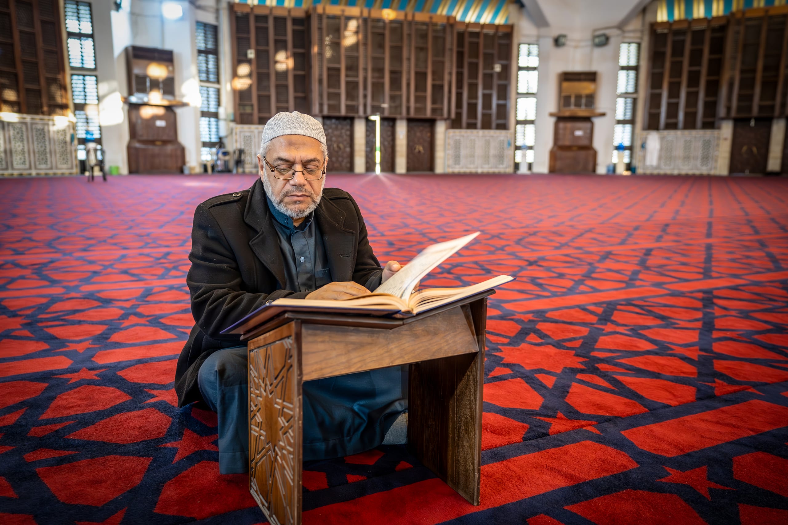 OLD MAN Read Quran Masjid Ramadain, a fine-art photograph by Ali Abu Ras