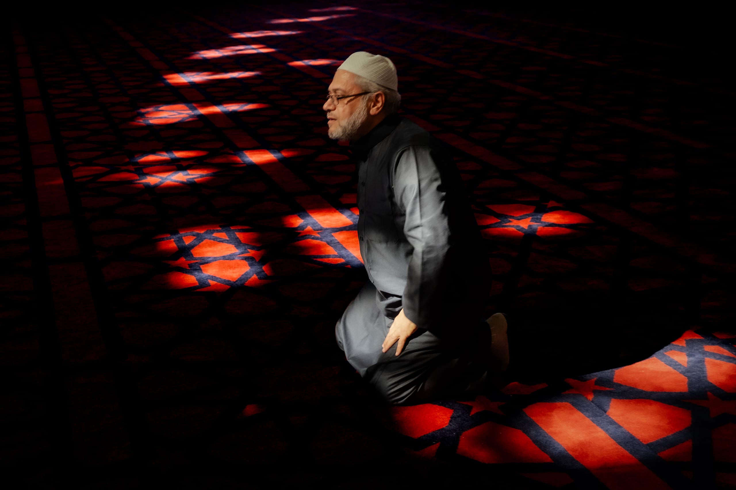 MAN Read Quran Masjid Ramadain, a fine-art photograph by Ali Abu Ras