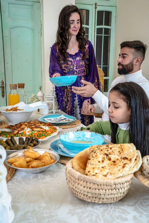 Family Ramadan Eftar Food Eating, a fine-art photograph by Ali Abu Ras