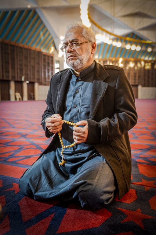 MAN OLD Masjed Pray, a fine-art photograph by Ali Abu Ras