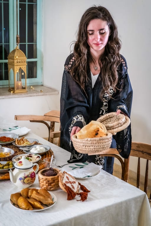 Ramadan Woman Noor Eftar Sohour, a fine-art photograph by Ali Abu Ras