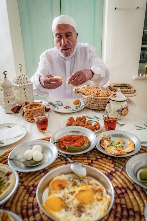 Family Ramadan Eftar Food Eating, a fine-art photograph by Ali Abu Ras