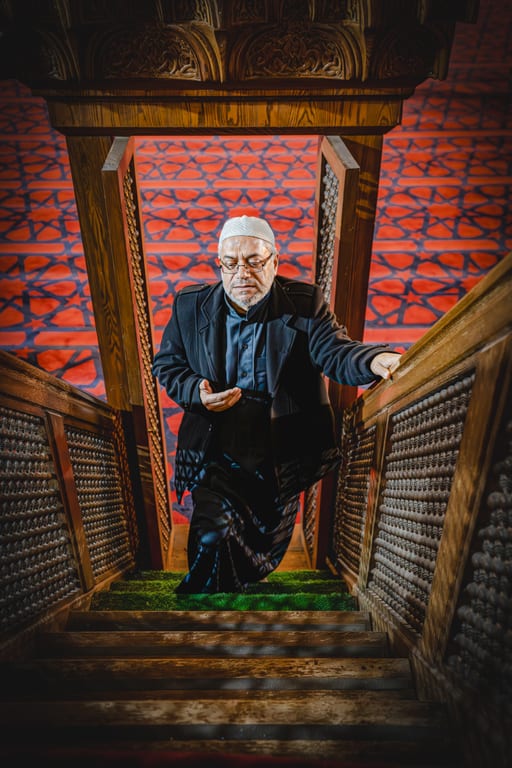 MAN Stares Masjed Pray, a fine-art photograph by Ali Abu Ras