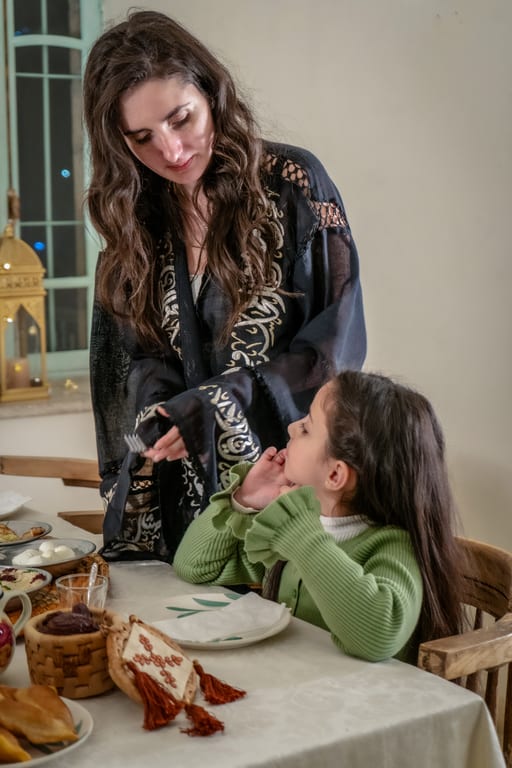 Family Ramadan Eftar Food Eating, a fine-art photograph by Ali Abu Ras
