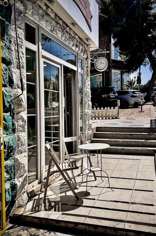 Shop Place Charis Table Street Amman, a fine-art photograph by Ali Abu Ras