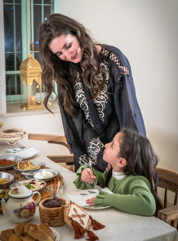 Ramadan Woman Noor Eftar Sohour, a fine-art photograph by Ali Abu Ras