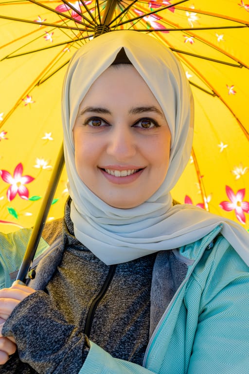 Woman Rola Potrait Face SUN Umbrela, a fine-art photograph by Ali Abu Ras