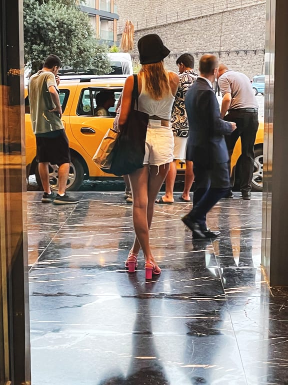 Woman Life Style Street Standing Tarabozon, a fine-art photograph by Ali Abu Ras