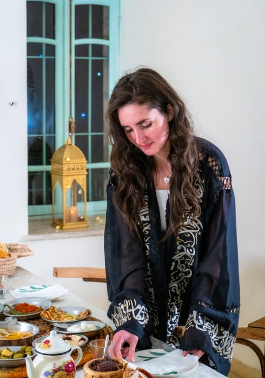Ramadan Woman Noor Eftar Sohour, a fine-art photograph by Ali Abu Ras