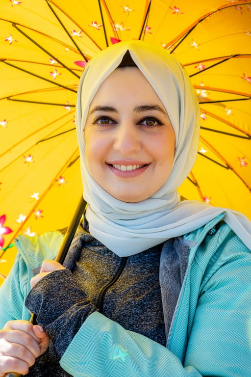 Woman Rola Potrait Face SUN Umbrela, a fine-art photograph by Ali Abu Ras
