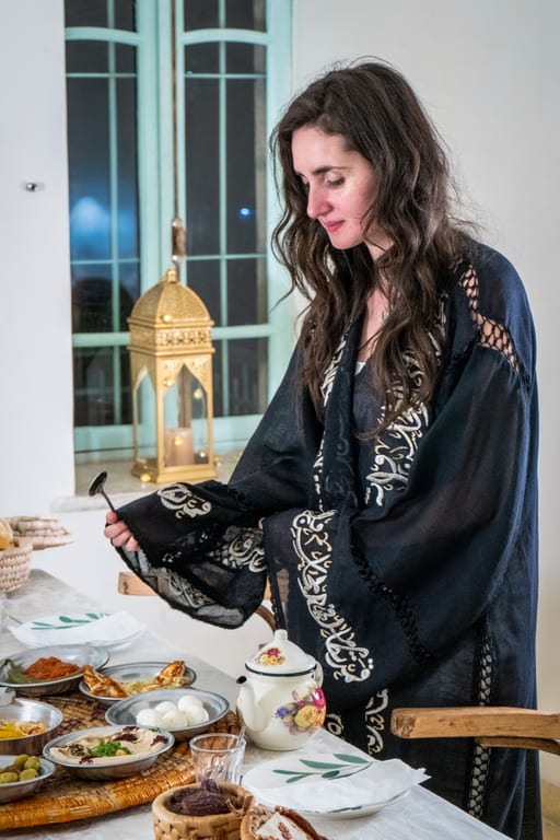 Ramadan Woman Noor Eftar Sohour, a fine-art photograph by Ali Abu Ras
