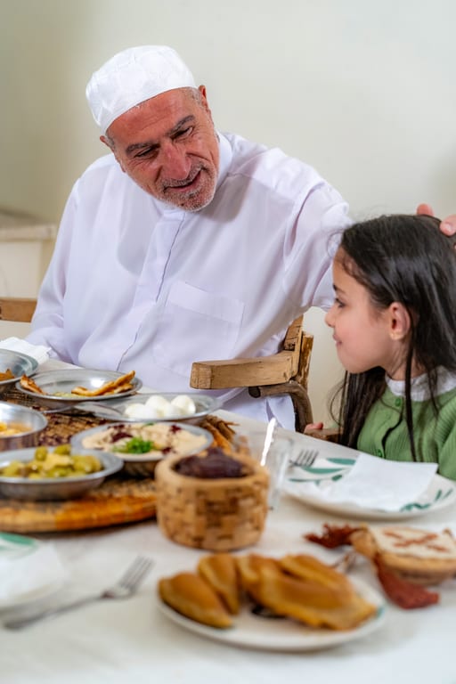 Family Ramadan Eftar Food Eating, a fine-art photograph by Ali Abu Ras