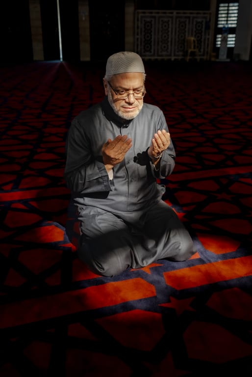 MAN Read Quran Masjid Ramadain, a fine-art photograph by Ali Abu Ras