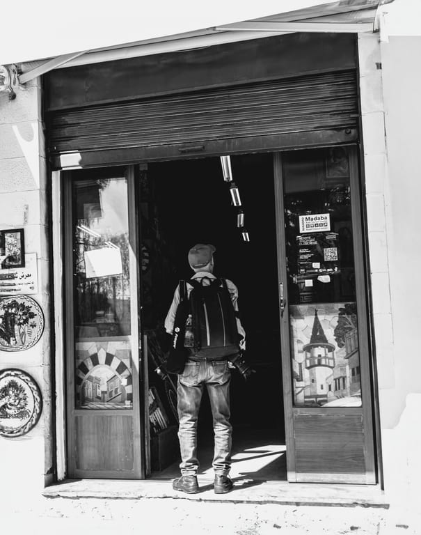 Madaba MAN Shop Street, a fine-art photograph by Ali Abu Ras