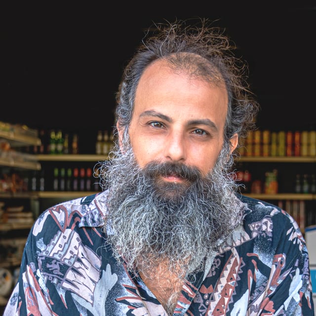 Portrait MAN People Street, a fine-art photograph by Ali Abu Ras