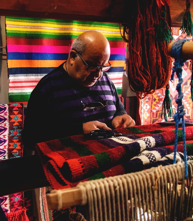 Madaba Market Carbets Store MAN, a fine-art photograph by Ali Abu Ras
