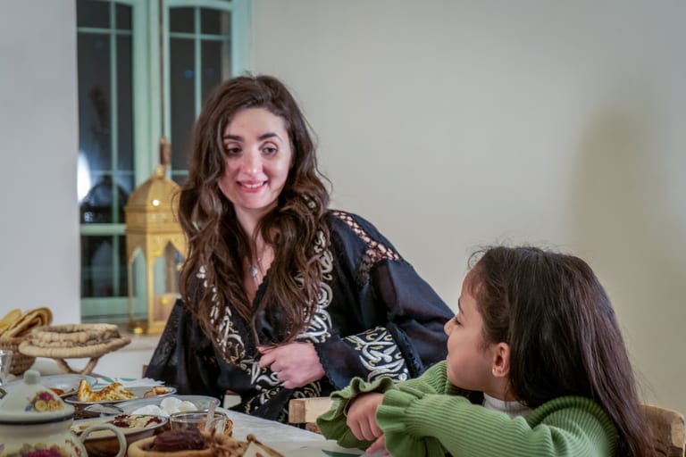 Ramadan Woman Noor Eftar Sohour, a fine-art photograph by Ali Abu Ras
