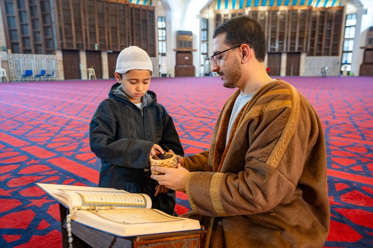 BOY Father Masjed Quran, a fine-art photograph by Ali Abu Ras