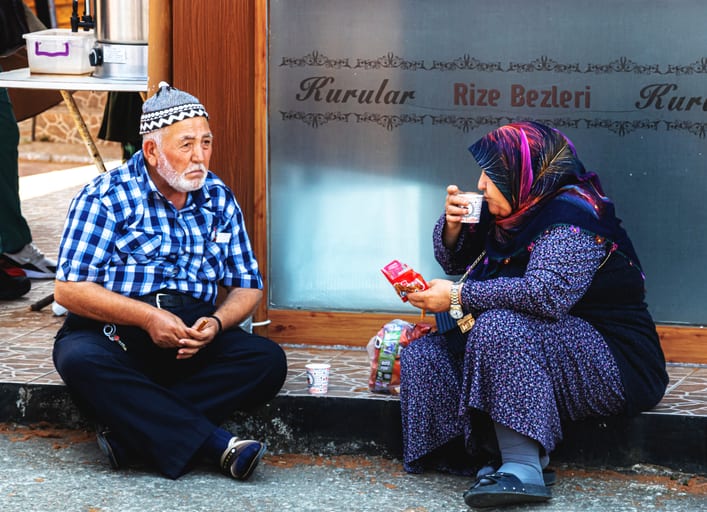 People Street OLD MAN OLD Woman EAT, a fine-art photograph by Ali Abu Ras