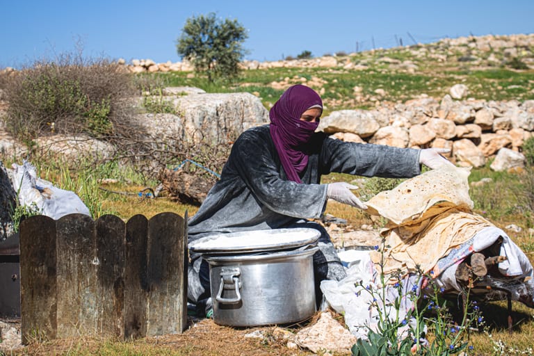 Woman Work Create Bread Outdoor Graesa, a fine-art photograph by Ali Abu Ras