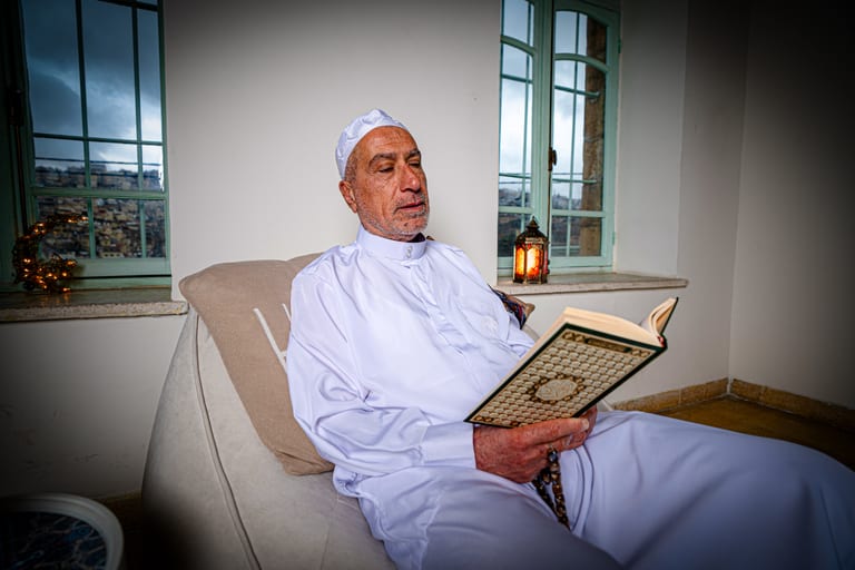 Ramadan OLD MAN Read Quran, a fine-art photograph by Ali Abu Ras
