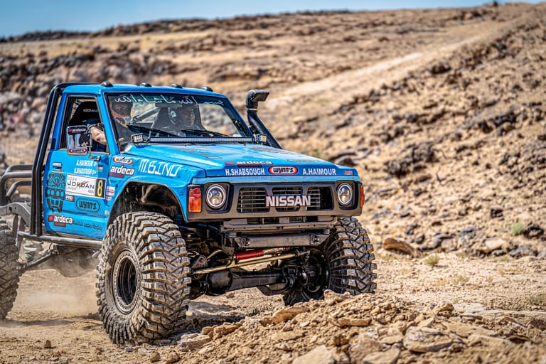 4 X 4 CAR RED Deadsea, a fine-art photograph by Ali Abu Ras