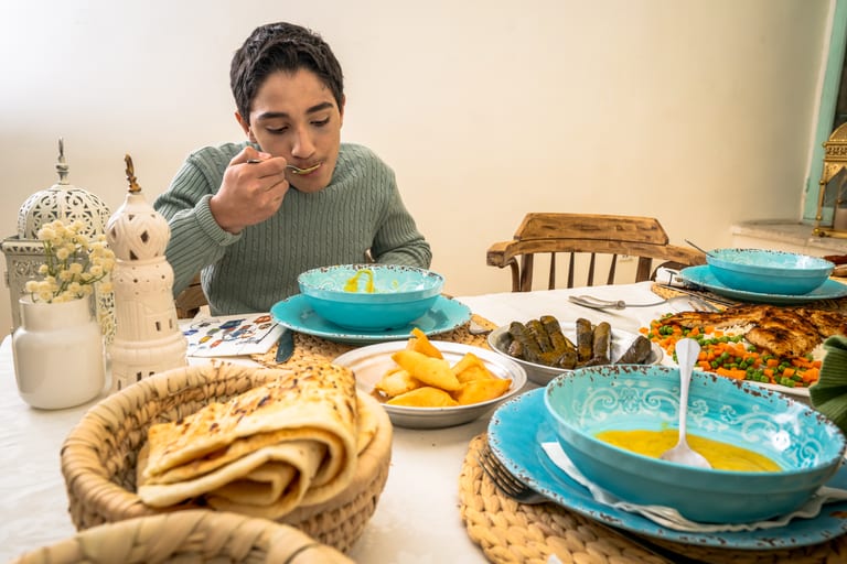 Family Ramadan Eftar Food Eating, a fine-art photograph by Ali Abu Ras