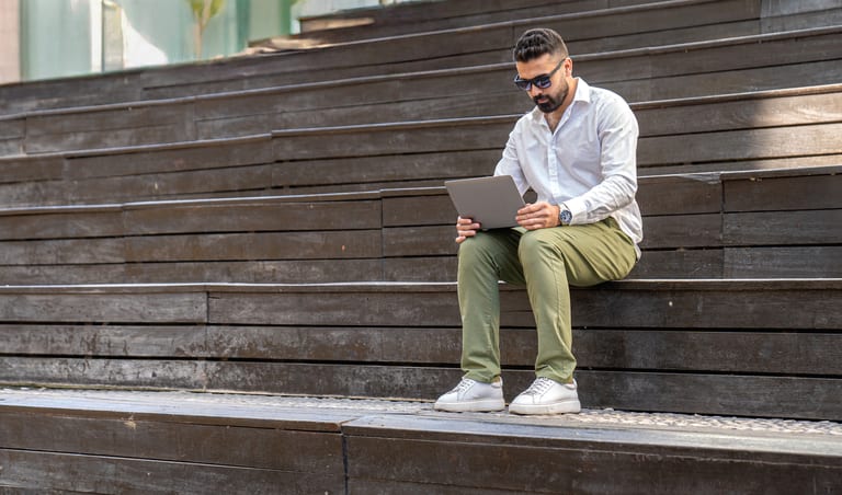 MAN Laptop Setting, a fine-art photograph by Ali Abu Ras